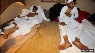 Two boys wounded in Misrata rest aboard a Turkish hospital ship in Benghazi, 3 April