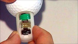 Golf ball with transmitter inside