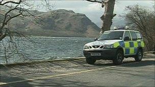 Police car by side of Ullswater