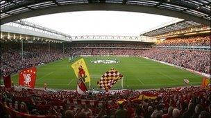 Supporters inside Anfield Stadium