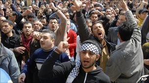 Anti-government protesters shout slogans as they protest after Friday prayers at Omayyad mosque, in Damascus, March 25, 2011