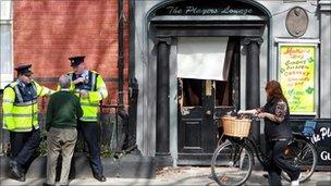 officers outside pub