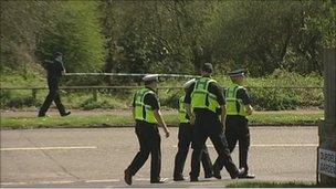 Police at the scene at Kinson Common