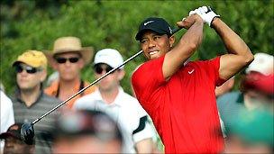 Tiger Woods in action during his final round at the Augusta Masters on Sunday