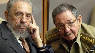 Fidel Castro, left, and his brother Raul, in Cuba, on 1 July, 2004