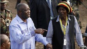 Alpha Blondy (R) and Laurent Gbagbo (L) together at a reconciliation concert of Alpha Blondy's in Ivory Coast in 2007. Photo by Kambou Sia/AFP/Getty Images
