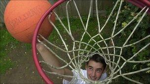 Boy playing basket ball