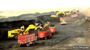 Trucks carrying coal
