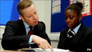 Education Secretary Michael Gove speaks to pupil at Pimlico Academy