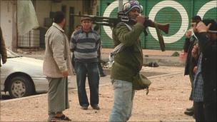 Rebel fighter on Misrata street