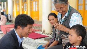 Lobsang Sangay meets people in the street during his election campaign