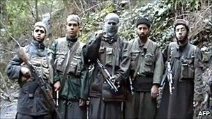 A picture taken from a video posted on April 25 on internet and attributed to Al-Qaeda in the Islamic Maghreb (AQIM) shows five armed youths, one of them masked, announcing that they would defend prisoners detained in Morocco.