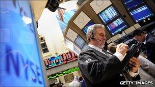 A trader works on the floor of the New York Stock Exchange