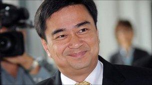 Thai Prime Minister Abhisit Vejjajiva arrives at Parliament in Bangkok (May 2011)