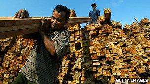 Hardwood being offloaded in Indonesia