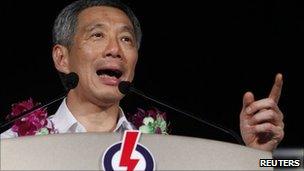 Singapore's Prime Minister Lee Hsien Loong speaks during a People's Action Party (PAP) election rally in Singapore on 5 May 2011