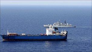 HMS Liverpool shadowing a vessel off the Libyan coast