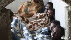Eritrean migrants in Sinai safe house