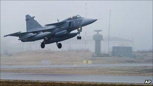 Swedish airforce jet takes off from base in Sweden to join the Nato-led operation in Libya