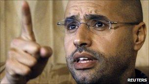 Saif al-Islam speaks during an interview with Reuters in Tripoli in this March 10, 2011 file photo