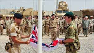 The union jack is lowered at Umm Qasr at the end of the naval training mission