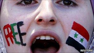 Syrian woman in Jordan protests against President Assad