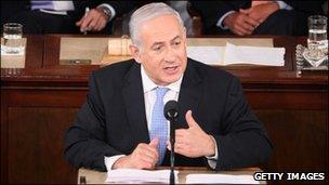 Israeli Prime Minister Benjamin Netanyahu (C) addresses a joint meeting of the U.S. Congress as U.S