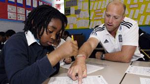 Matt Prior helps out with a maths lessons
