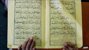 Student reads the Koran
