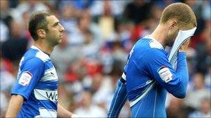 Reading's Matt Mills (right) leaves the pitch looking dejected during the Football League Championship play off Final at Wembley Stadium on Monday.