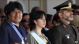 Bolivian President Evo Morales, left, Iran"s Defence Minister Ahmad Vahidi, right, and Bolivia's Defence Minister Maria Cecilia Chacon, centre, at a military ceremony in Santa Cruz, Bolivia