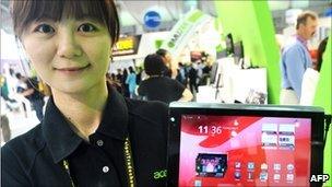 Woman holding Acer tablet