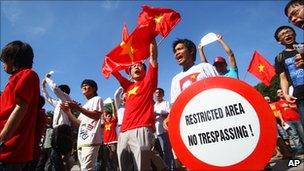 Protesters shout anti-China slogans during a protest in Hanoi, 5 June 2011.