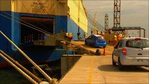 Nissan Micra cars being driven on to a Korean freighter at Ennore port