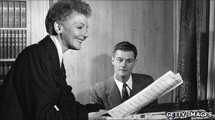 Mary Martin at piano with son Larry Hagman in 1951