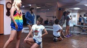 South Korean girl band Rainbow rehearse at a studio in Seoul