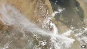 Image released by the Nasa captured by the Moderate Resolution Imaging Spectroradiometer (Modis) on the Aqua satellite shows plume billowing from the Nabro volcano in Eritrea on June 13, 2011
