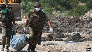 Government facility to a mass grave near Jisr al-Shughour allegedly containing the corpses of eight soldiers - 26 June