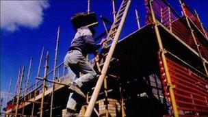 Builders on building site
