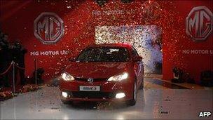 A new MG6 vehicle is unveiled at the Chinese-owned MG factory in Longbridge on 13 April 2011