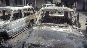 Damaged vehicles at the police station in Kolachi, Pakistan
