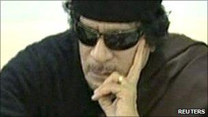 Muammar Gaddafi plays chess with Kirsan Ilyumzhinov, the president of the international chess federation, in Tripoli on 12 June, 2011 in a still image taken from Libyan state TV broadcast