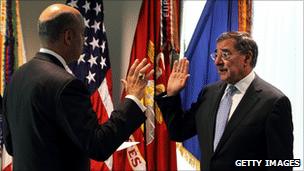 Leon Panetta is sworn in by defence department General Counsel Jeh Johnson