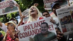 Supporters of Mr Chavez take part in a rally in Caracas 4 July 2011