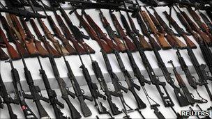 Seized weapons are displayed to the media by the Mexican Navy in Mexico City 9 June, 2011