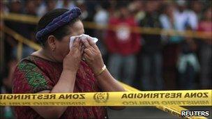 Nobel Peace Prize winner, Rigoberta Menchu, at the crime scene, 9 July