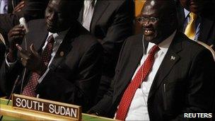 South Sudan's Vice President Riek Machar smiles with delegates after the United Nations General Assembly voted on South Sudan's membership to the United Nations at the UN. headquarters in New York July 14, 2011