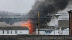 Buildings on fire at Ford open prison