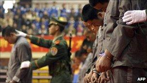 Chinese police show of a group of hardcore convicts at a sentencing rally in the east Chinese city of Wenzhou 07 April 2004