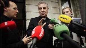 Papal Nuncio Archbishop Giuseppe Leanza speaks to the media as he leaves the Department of Foreign Affairs in Dublin